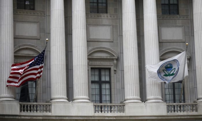 Flags fly outside the U.S. Environmental Protection Agency (EPA) at EPA headquarters in Washington, on July 11, 2018. (Reuters/Ting Shen)