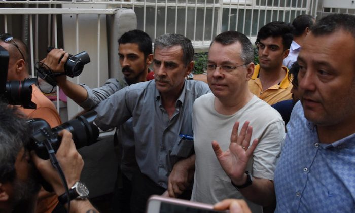 U.S. pastor Andrew Brunson reacts as he arrives at his home after being released from the prison in Izmir, Turkey July 25, 2018. (Demiroren News Agency, DHA via REUTERS)