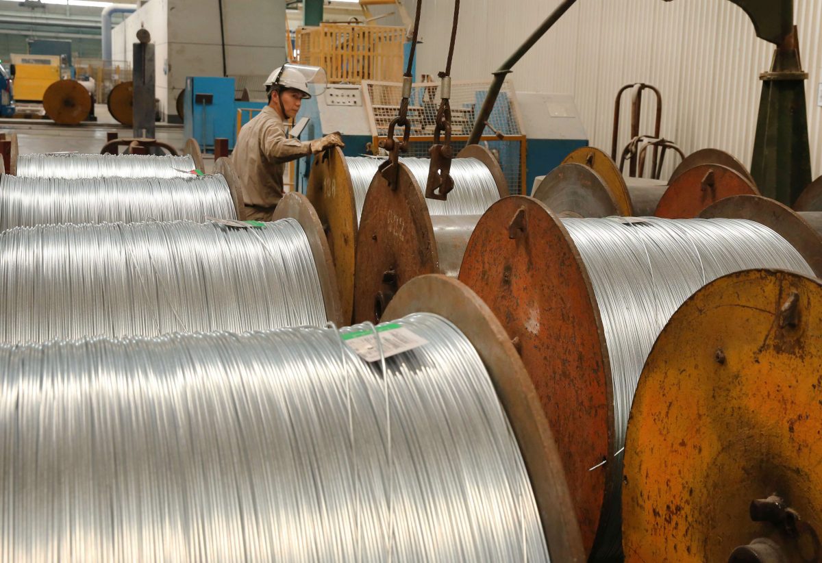 A worker handles steel cables at a steel factory in Nantong in eastern China's Jiangsu Province on July 3, 2018. The trade war between the United States and China began with the imposition of tariffs on Chinese steel and aluminum. (-/AFP/Getty Images)