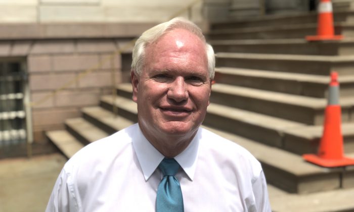 New York State Senator Tony Avella, a democrat, stands near the steps of City hall in New York at a press event on Tuesday, July 31, 2018. (Bowen Xiao/The Epoch Times)