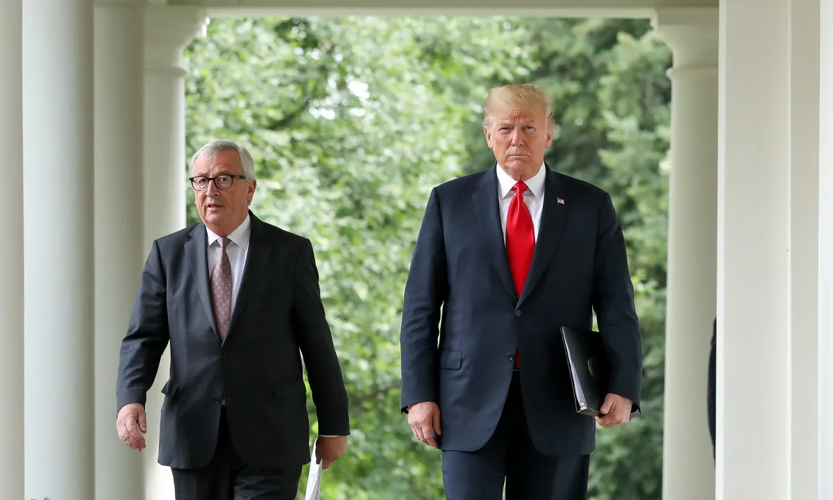 President Donald Trump walks with the President of the European Commission Jean-Claude Juncker to  the Rose Garden of the White House for a joint press conference, in Washington on July 25, 2018. (Samira Bouaou/The Epoch Times)