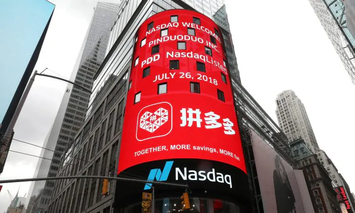 A display at the Nasdaq Market Site shows a message after Chinese e-commerce platform Pinduoduo (PDD) was listed on the Nasdaq exchange in Times Square, New York City, on July 26, 2018. (Mike Segar/Reuters) 