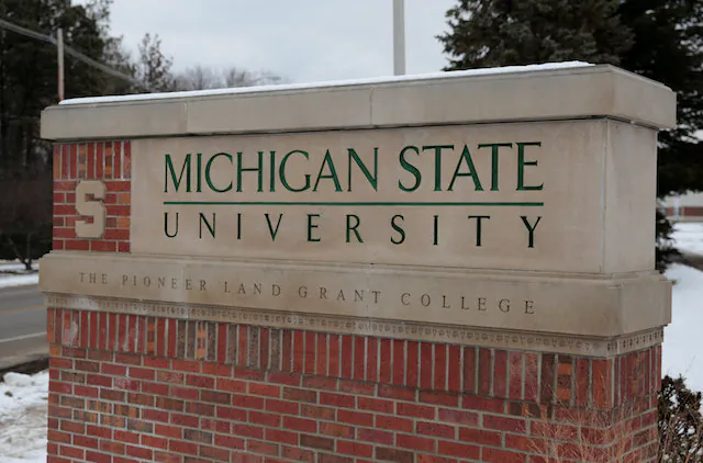 A sign for Michigan State University is seen near the campus in East Lansing, Mich., on Feb. 1, 2018. (Rebecca Cook/Reuters)