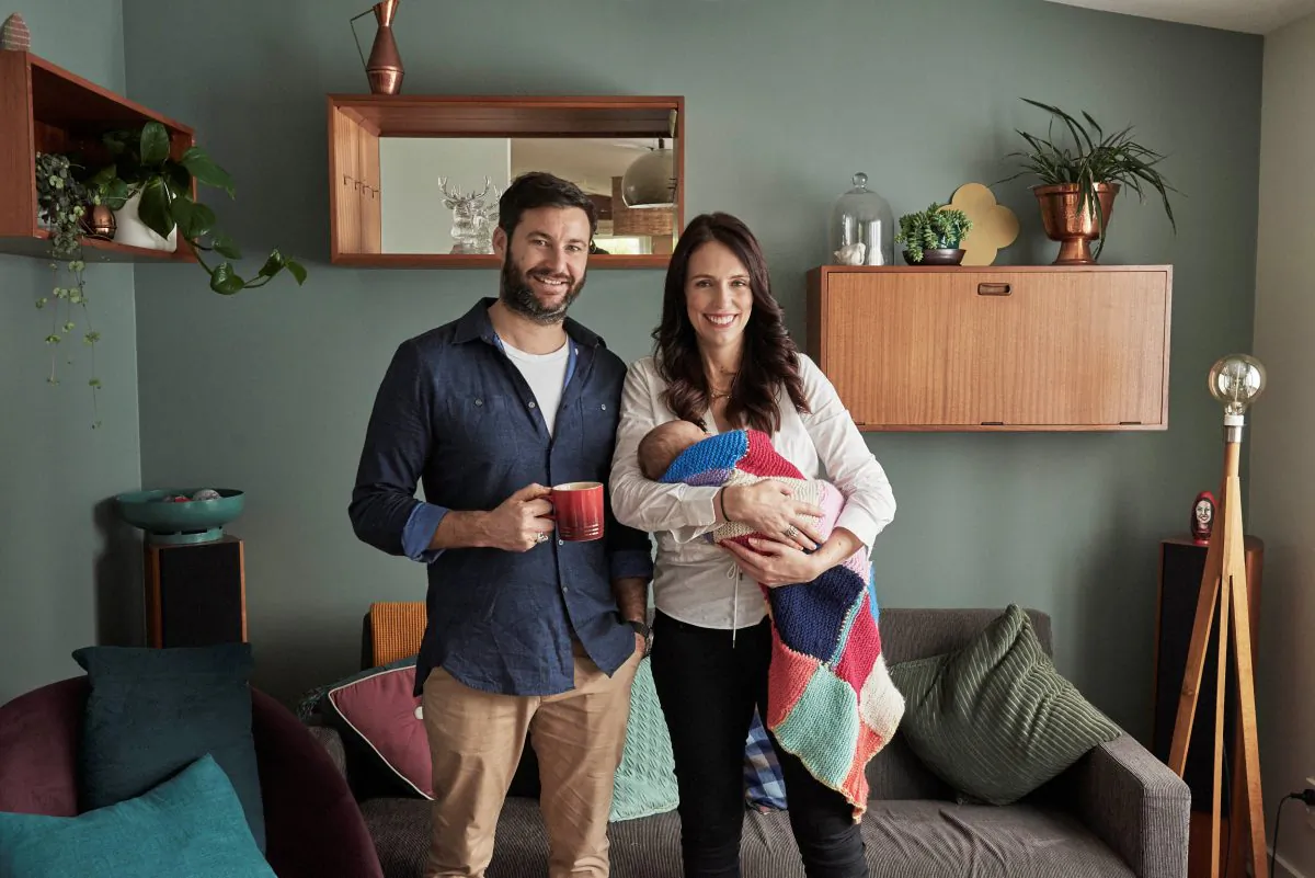 New Zealand PM Jacinda Ardern, carries her newborn baby Neve Te Aroha Ardern Gayford with her partner Clarke Gayford in New Zealand, August 1, 2018. (Derek Henderson/New Zealand Prime Minister’s Office/Handout via Reuters)