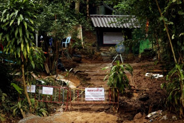 A "Restricted Area" sign is seen in front of the Tham Luang cave complex, after the rescue mission for the 12 boys of the "Wild Boars" soccer team and their coach, in the northern province of Chiang Rai, Thailand July 14, 2018.