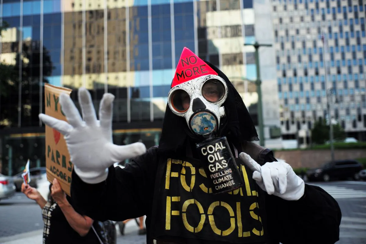 An environmental activist protests President Donald Trump’s decision to pull out of the Paris climate accord deal, in New York on June 1, 2017. (JEWEL SAMAD/AFP/Getty Images)