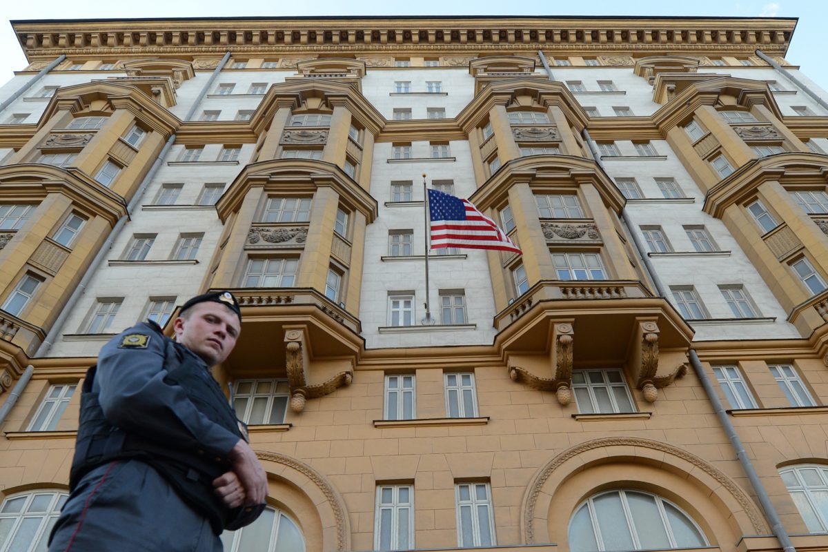 A Russian police officer patrols a street in front of the US Embassy in Moscow, the headquarters of US Agency for International Development (USAID ) Russia’s mission, on September 20, 2012. (KIRILL KUDRYAVTSEV/AFP/GettyImages)