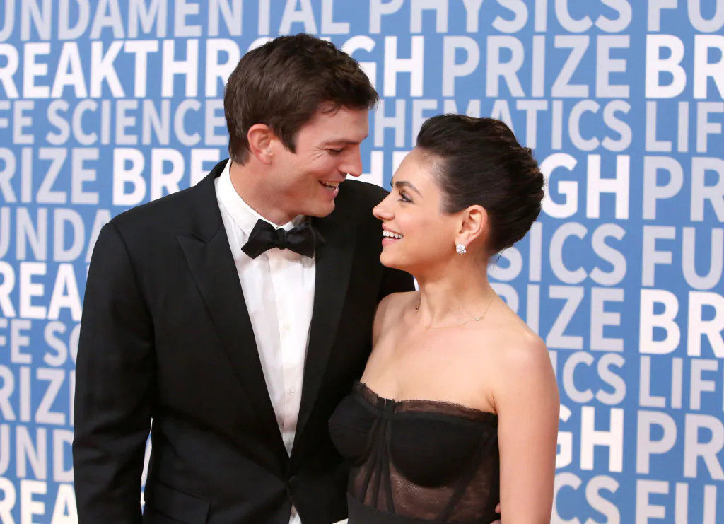 Actors Ashton Kutcher (L) and Mila Kunis attend the 2018 Breakthrough Prize at NASA Ames Research Center on December 3, 2017 in Mountain View, California. (Jesse Grant/Getty Images)