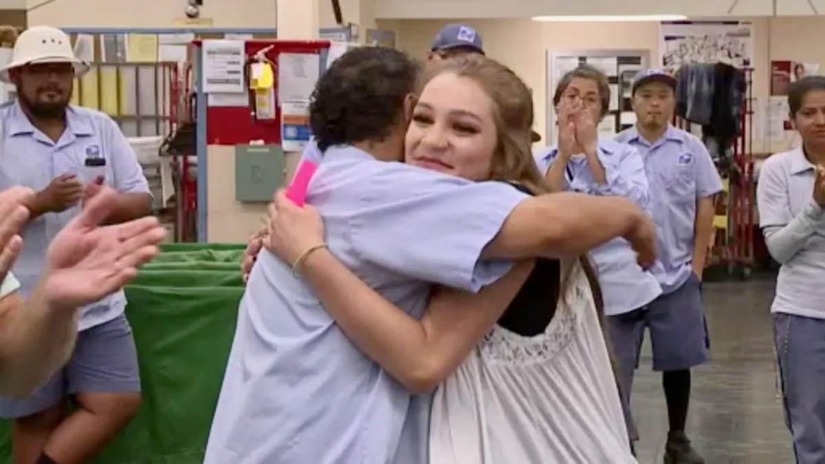 Mailman Ivan Crisostomo and the human trafficking victim he helped rescue, Crystal Allen, in Sacramento, California on Aug. 2, 2018. (Image via Fox)