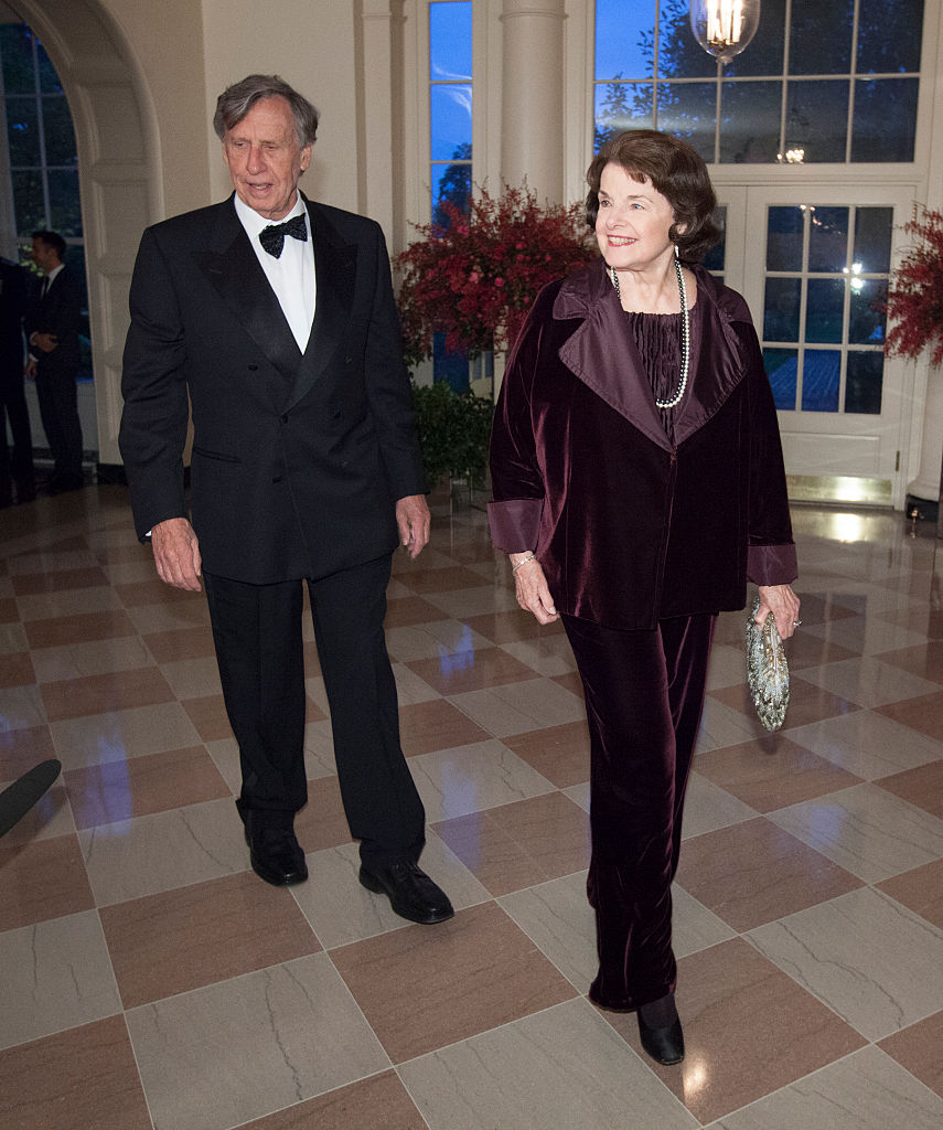 Dianne Feinstein, U.S.Senator and Richard Blum arrive at the State Dinner for China's President Xi and Madame Peng Liyuan at the White House for an official State Visit in Washington on Sept. 25, 2015. (Photo by Chris Kleponis-Pool/Getty Images)