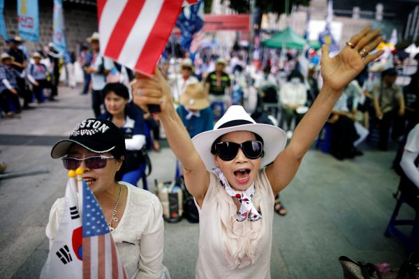 Members of a conservative civic group attend an anti-North Korea and pro-U.S. protest in Seoul, South Korea, Aug. 4, 2018