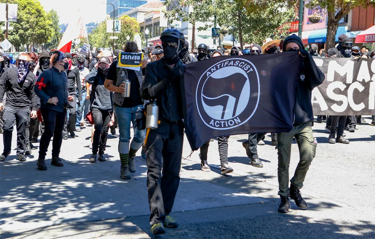 Antifa militants march with counter protesters, opposing alt-right rally in Berkeley, Aug. 5, 2018. (Amy Osborne/AFP/Getty Images)