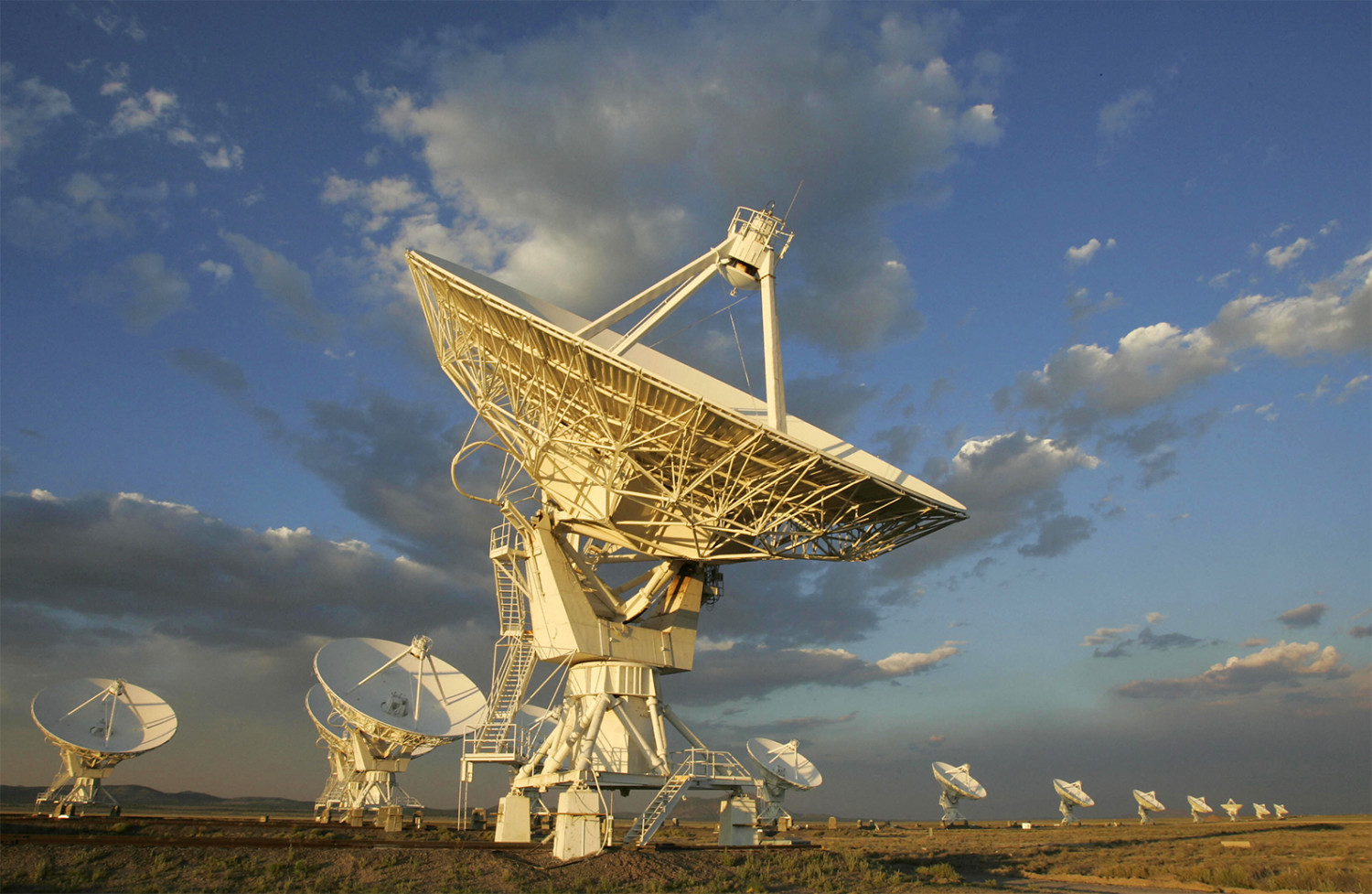 The sun sets over the Very Large Array (VLA), on the Plains of San Agustin 50 miles west of Socorro, New Mexico, on July 5, 2005. (Robyn Beck/AFP/Getty Images)