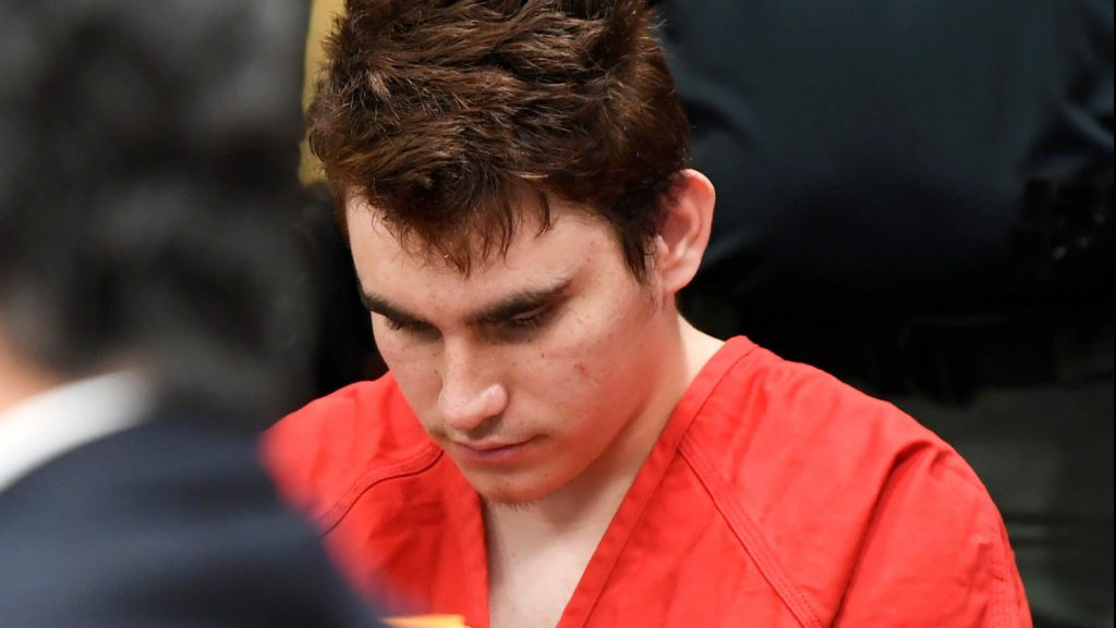 Nikolas Cruz sits next to his attorneys appointed by the Broward Public Defender’s Office as a judge determines if he can afford his own lawyer, in Broward Courthouse in Fort Lauderdale, Florida on April 11, 2018. (Taimy Alvarez/Pool via Reuters)