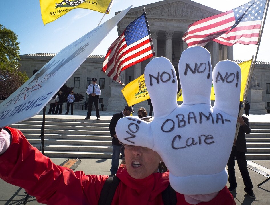 An individual protests the Affordable Care Act, also known as Obamacare, outside the U.S. Supreme Court in Washington on March 28, 2012. (Mladen Antonov/AFP/Getty Images)