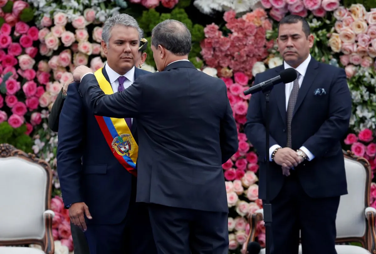 Colombia's President-elect Ivan Duque is sworn in during a ceremony in Plaza Bolivar in Bogota, on Aug. 7, 2018. (Reuters/Carlos Garcia Rawlins)
