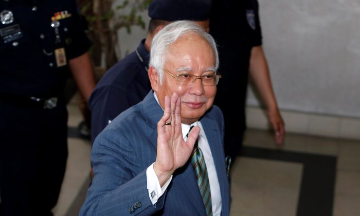 Malaysia's former Prime Minister Najib Razak arrives in court in Kuala Lumpur, Malaysia, on Aug. 8, 2018. (Lai Seng Sin/Reuters)