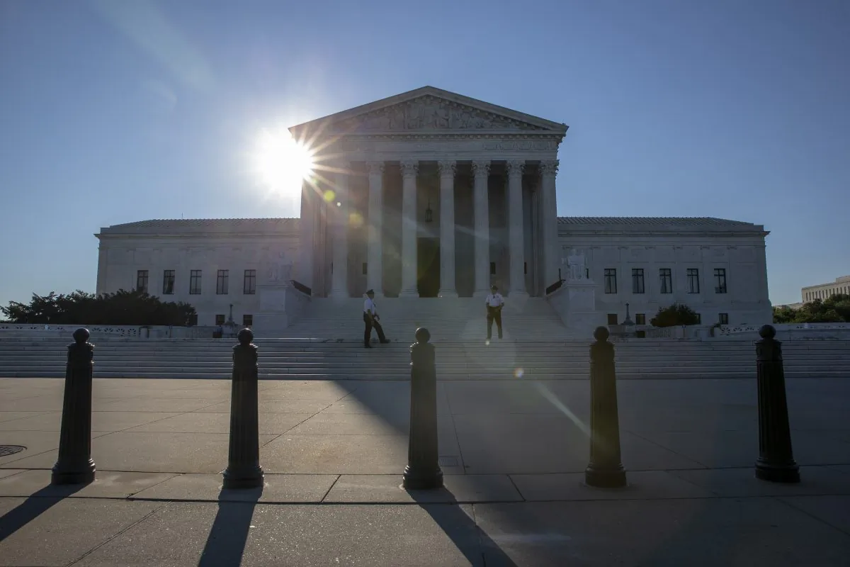 The sun rises over the United States Supreme Court on the morning of July 10, 2018 in Washington, DC. (Alex Edelman/Getty Images)