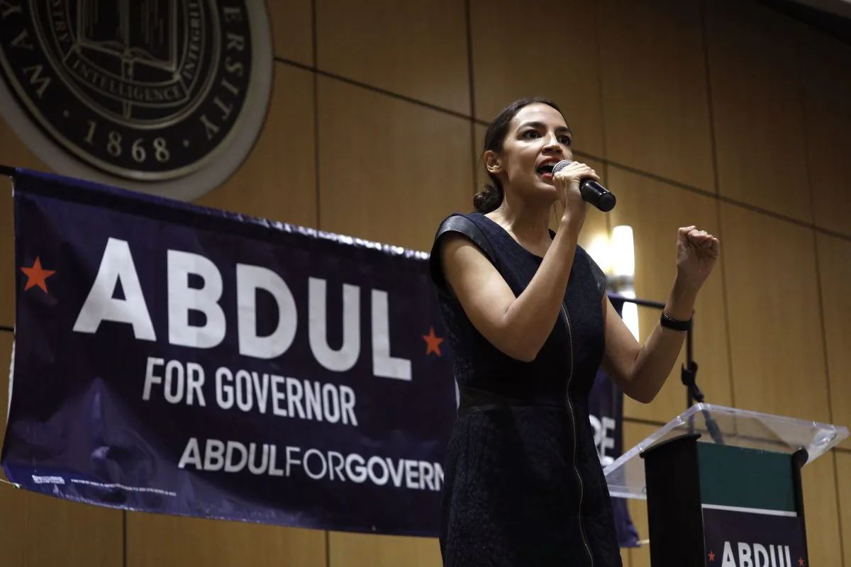 New York Democrat candidate for Congress and socialist Alexandria Ocasio-Cortez campaigns for Michigan Democratic gubernatorial candidate Abdul El-Sayed at a rally on the campus of Wayne State University July 28, 2018 in Detroit, Michigan. Sayed ran on left-wing policies and won 33 percent in a three-way primary on Aug. 8, losing to the liberal Gretchen Whitmer. (Bill Pugliano/Getty Images)
