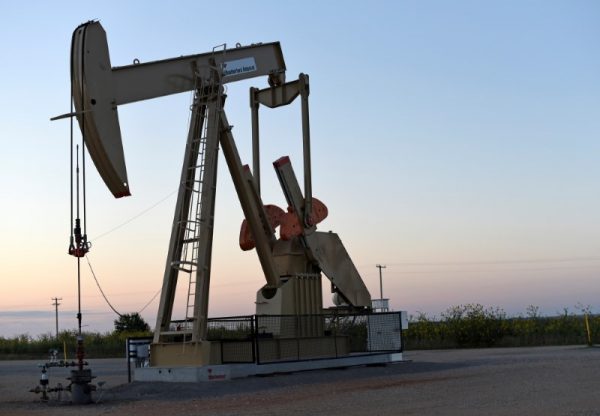 A pump jack operates at a well site.