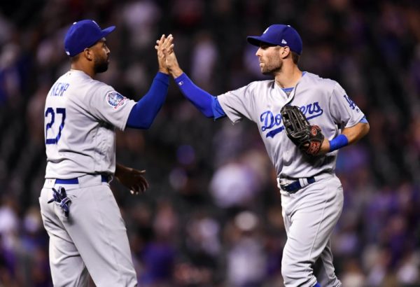 Dodgers Matt Kemp and Chris Taylor celebrate the win over the Colorado Rockies