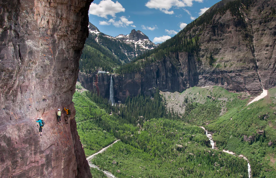Telluride's Via Ferrata takes hikers across 600 feet of rocky façade and over a 300-foot drop. (Courtesy of The Hotel Telluride)