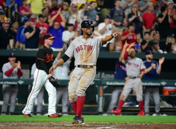 Boston Red Sox shortstop Xander Bogaerts reacts after scoring a run in the sixth inning against the Baltimore Orioles.