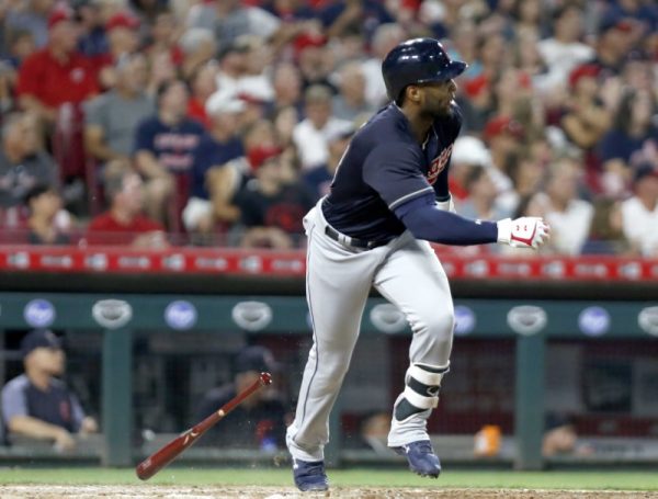 Cleveland Indians pinch hitter Yandy Diaz hits an RBI double against the Cincinnati Reds during the sixth inning.