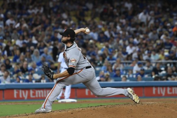 San Francisco Giants relief pitcher Ray Black throws a pitch during the eighth inning against the Los Angeles Dodgers at Dodger Stadium.