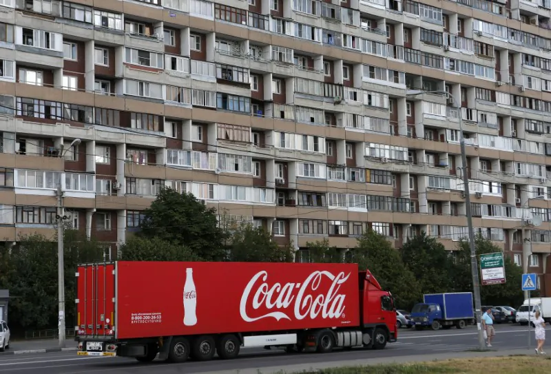 A truck transports bottles from Coca-Cola on the outskirts of Moscow on Aug. 6, 2014. (Reuters/Maxim Shemetov)