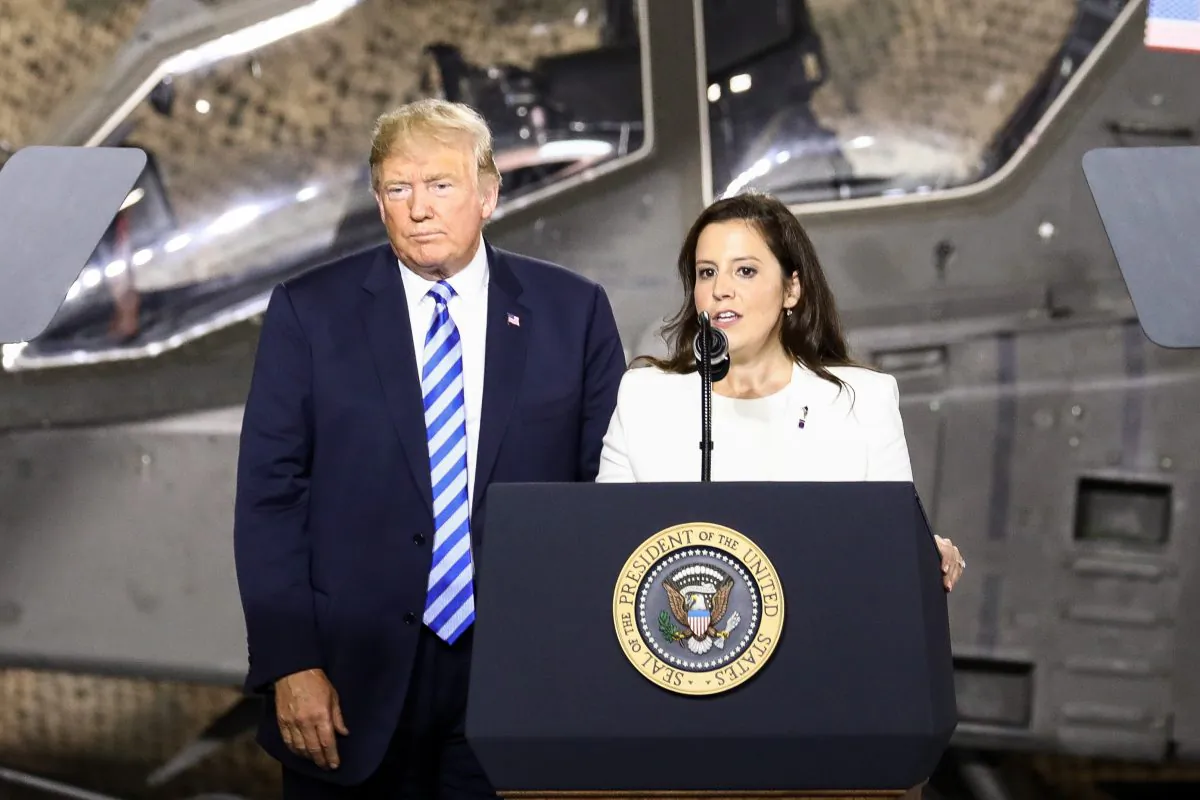 Rep. Elise Stefanik (R-N.Y.) alongside before then-President Donald Trump during an event on Aug. 13, 2018. (Charlotte Cuthbertson/The Epoch Times)