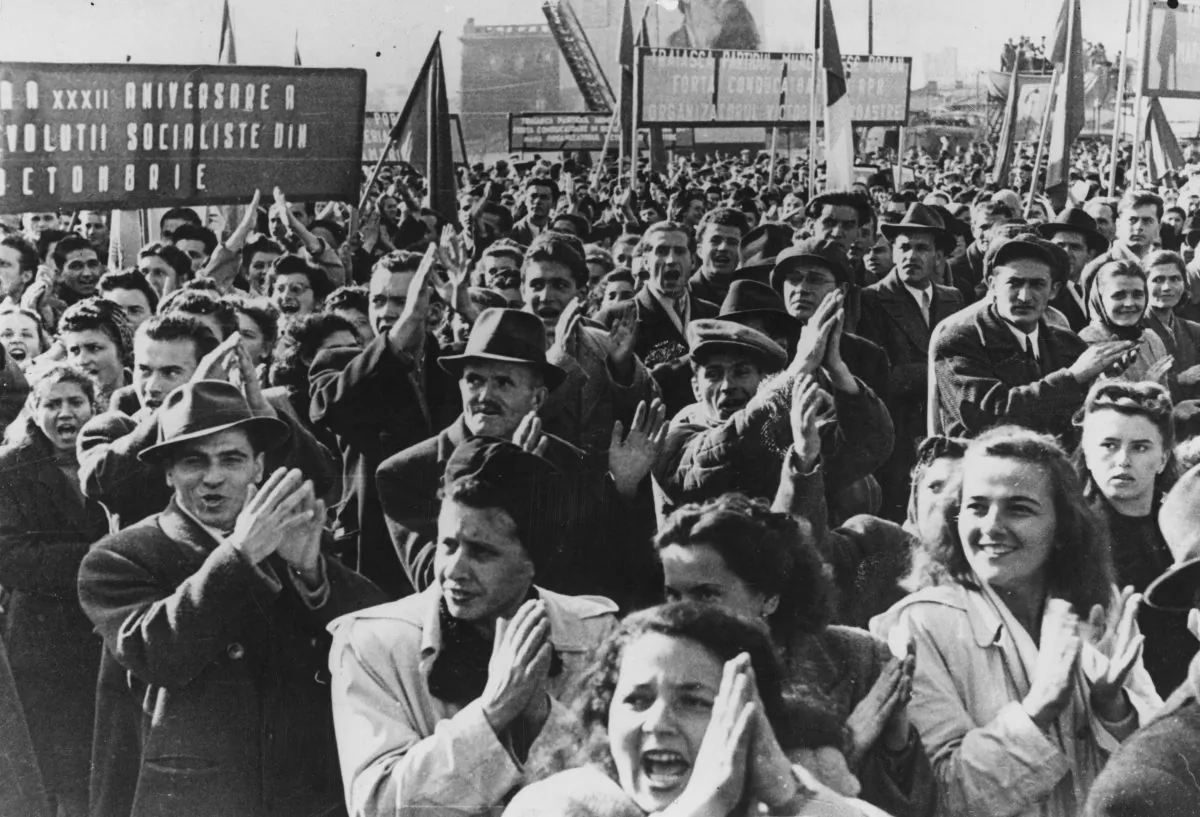 A crowd in Victory Square, Bucharest, Romania, on the 32nd anniversary of the Russian Revolution. (Keystone/Getty Images)