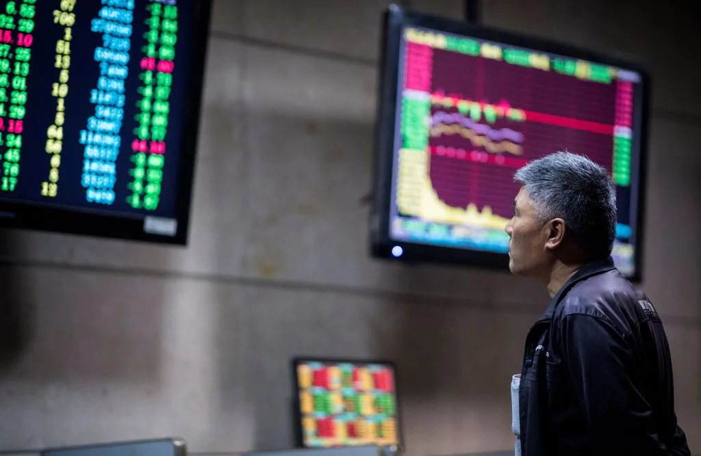 An investor monitors stock prices at a securities company in Shanghai on May 30, 2018. (Johannes Eisele/AFP/Getty Images)
