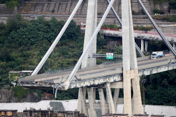 An aerial view of the remnants of the collapsed Morandi bridge