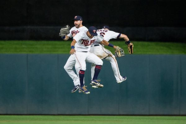 Minnesota Twins outfielder Jake Cave, outfielder Eddie Rosario and outfielder Max Kepler celebrate after the game against Pittsburgh Pirates.