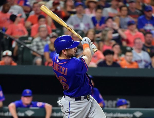 New York Mets catcher Kevin Plawecki hits a grand slam in the sixth inning against the Baltimore Orioles.