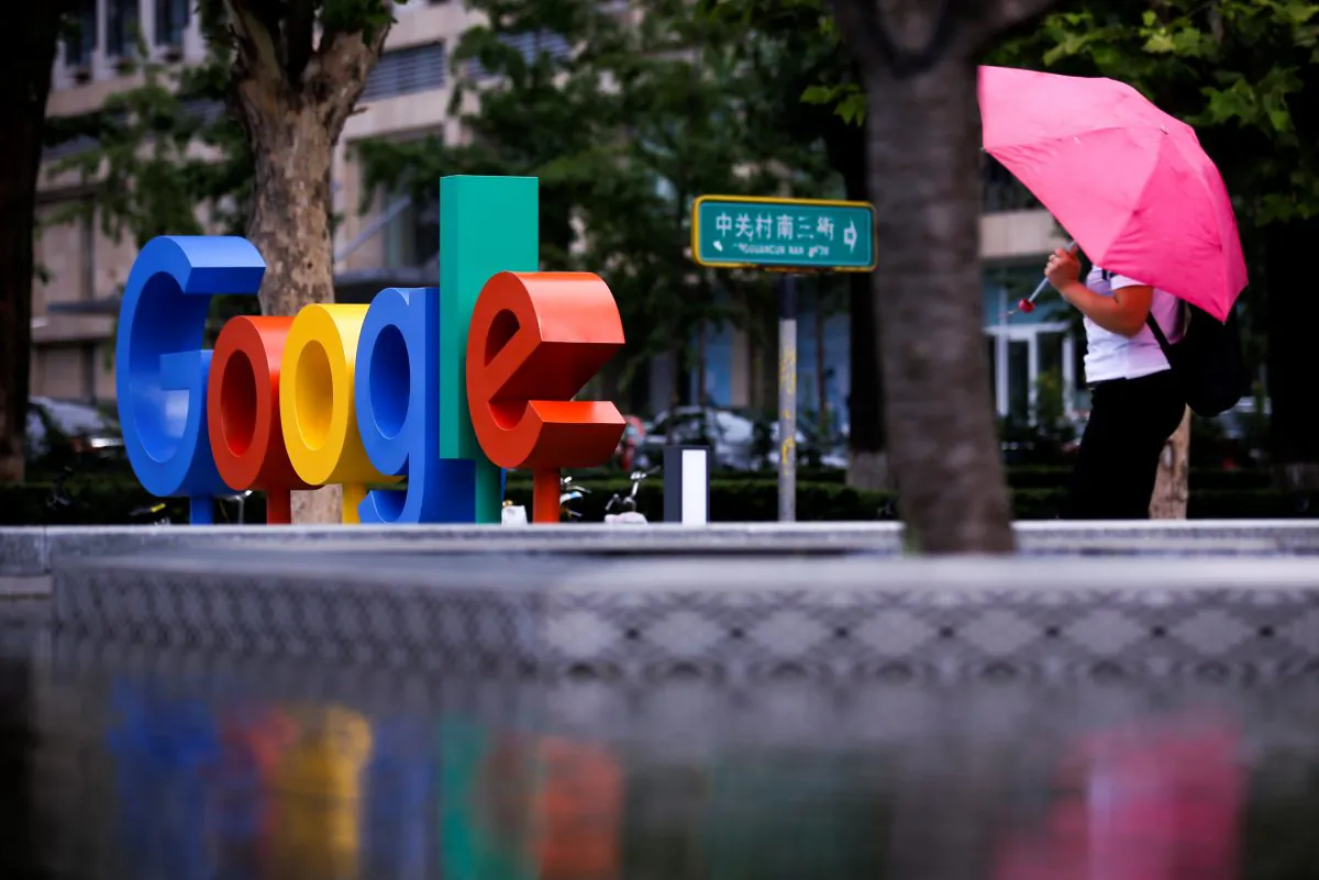 The brand logo of Alphabet Inc's Google is seen outside its office in Beijing, China, August 8, 2018. REUTERS/Thomas Peter