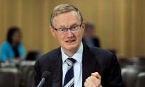Australia’s Reserve Bank Cuts Rate to Historic Low Citing Virus Impacts