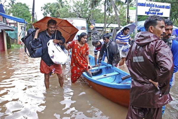 Torrential monsoon rains have disrupted air and train services in the southern Indian state of Kerala.