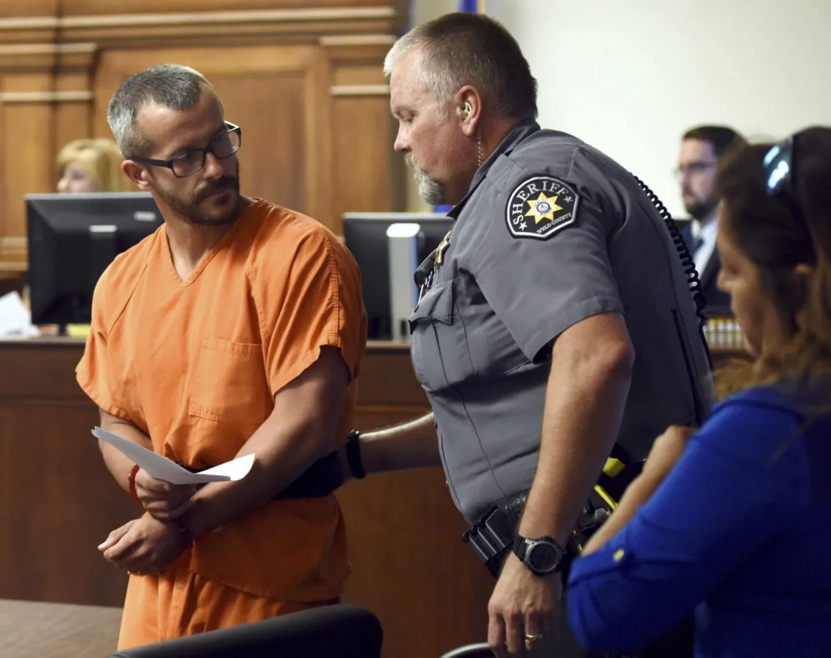 Christopher Watts is escorted into the courtroom before his bond hearing at the Weld County Courthouse in Greeley, Colo., on Aug. 16, 2018. (Joshua Polson/The Greeley Tribune via AP, Pool)