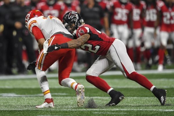 Atlanta Falcons linebacker Duke Riley tackles Kansas City Chiefs quarterback Patrick Mahomes during the first half.