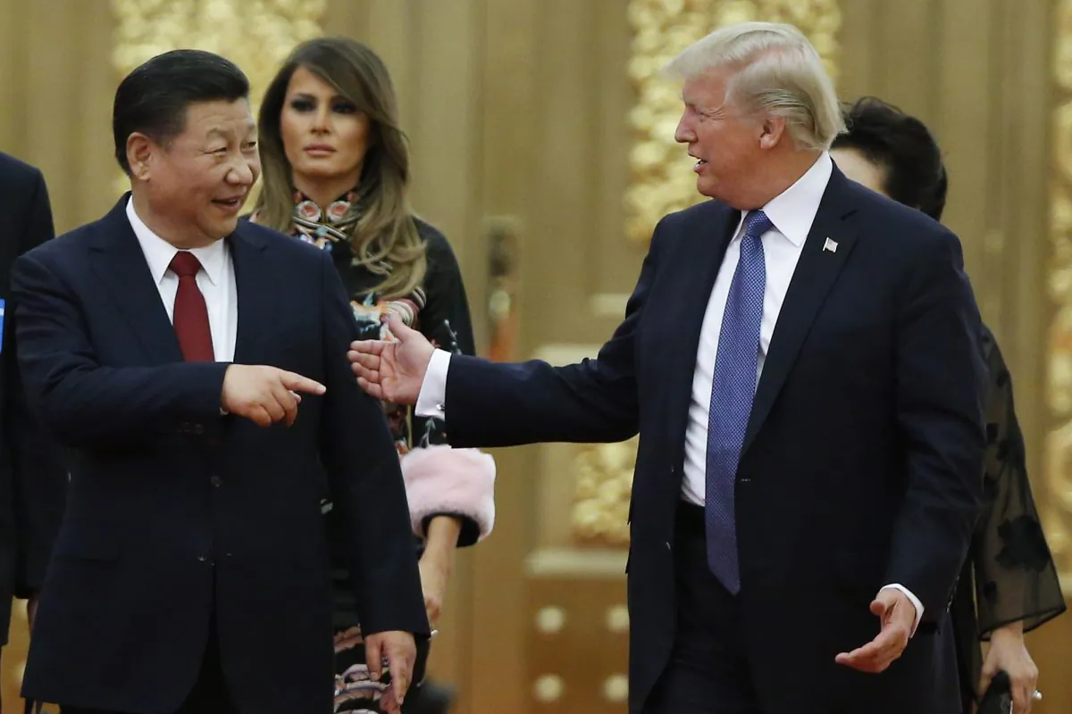 U.S. President Donald Trump and Chinese leader Xi Jinping arrive at a state dinner at the Great Hall of the People on Nov. 9, 2017 in Beijing, China. (Thomas Peter - Pool/Getty Images)