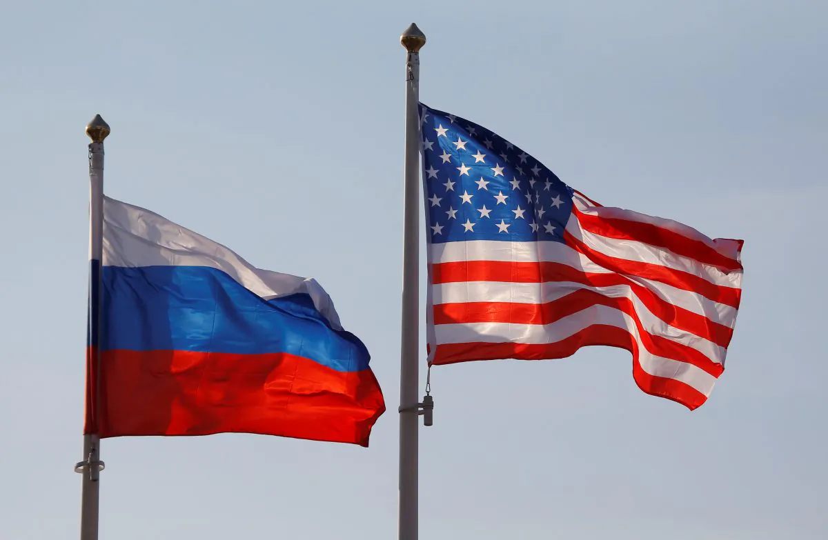 National flags of Russia and the United States fly at Vnukovo International Airport in Moscow, Russia, on April 11, 2017. (Maxim Shemetov/Reuters)