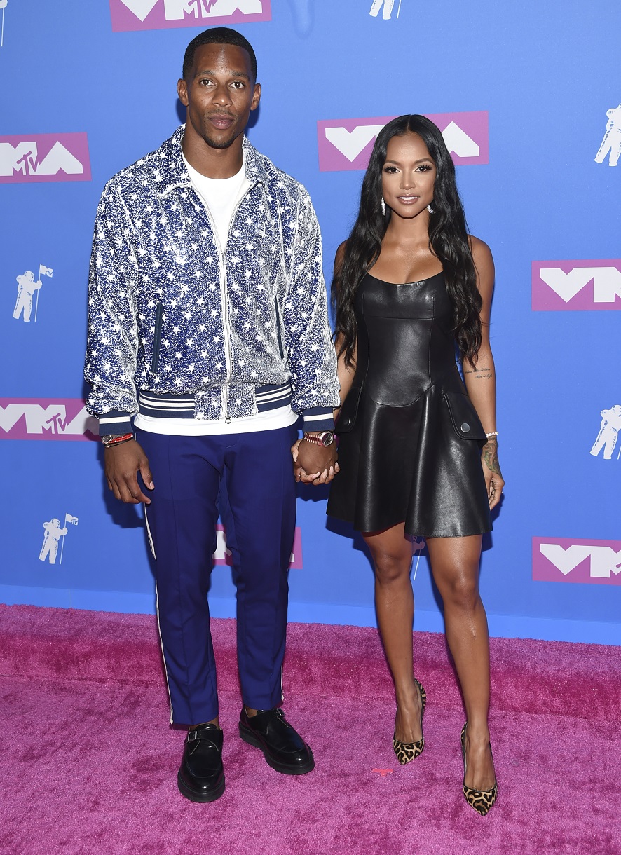 Victor Cruz (L) and Karrueche Tran.