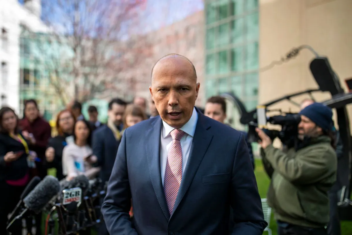 Australia's former home affairs minister, Peter Dutton, faces the media at a press conference in Canberra on Aug. 21, 2018. (Sean Davey/AFP/Getty Images)