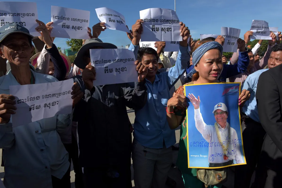 Cambodia National Rescue Party (CNRP) supporters hold placards that read "Free Kem Sokha" during a protest in Phnom Penh on September 26, 2017. Kem Sokha was the leader of the CNRP opposition party before it was dissolved. (Tang Chhin Sothy/AFP/Getty Images)