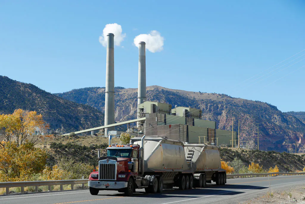 A coal truck drives by Pacificorp's 1000 megawatt coal fired power plant on October 9, 2017 outside Huntington, Utah. (George Frey/Getty Images)