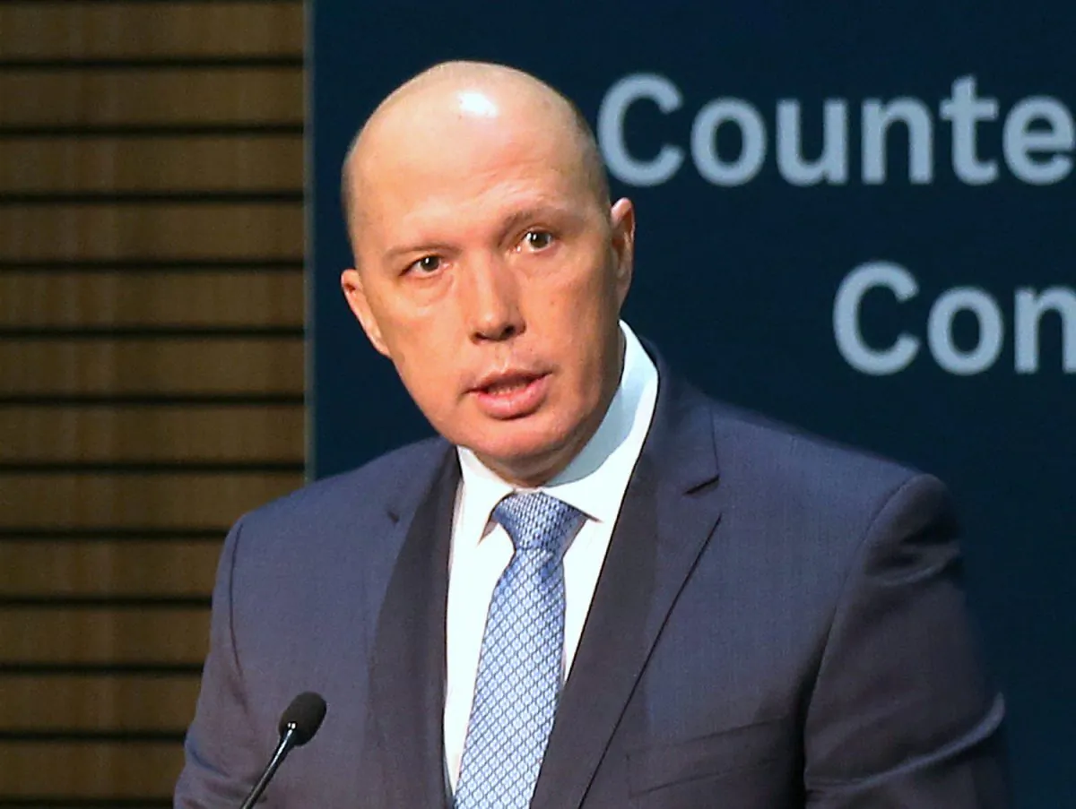 Australia's Home Affairs Minister Peter Dutton speaks at the opening of the Counter Terrorism Conference at being held during the one-off summit of 10-member Association of Southeast Asian Nations (ASEAN) in Sydney, Australia, March 17, 2018. (Rick Rycroft/Pool via Reuters/File photo)