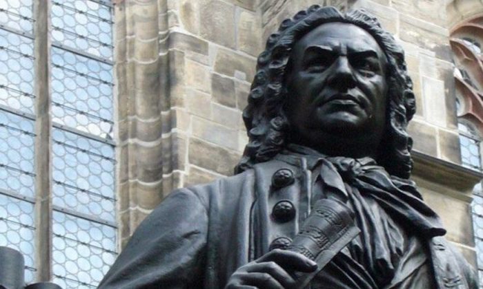 A statue of J.S. Bach in front of the St. Thomas Church in Leipzig, Germany. (Public Domain) 