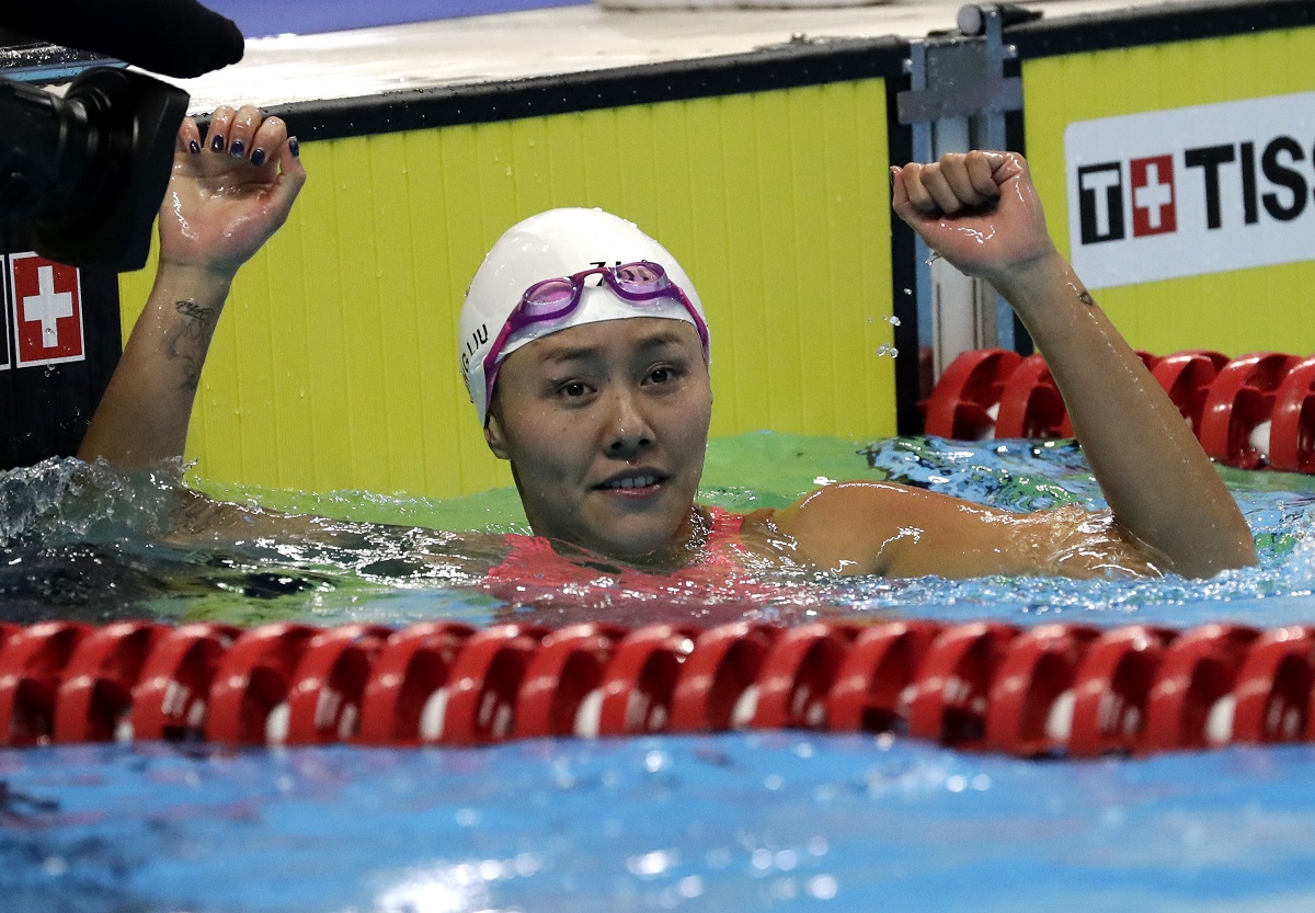 China's Liu Xiang celebrates.